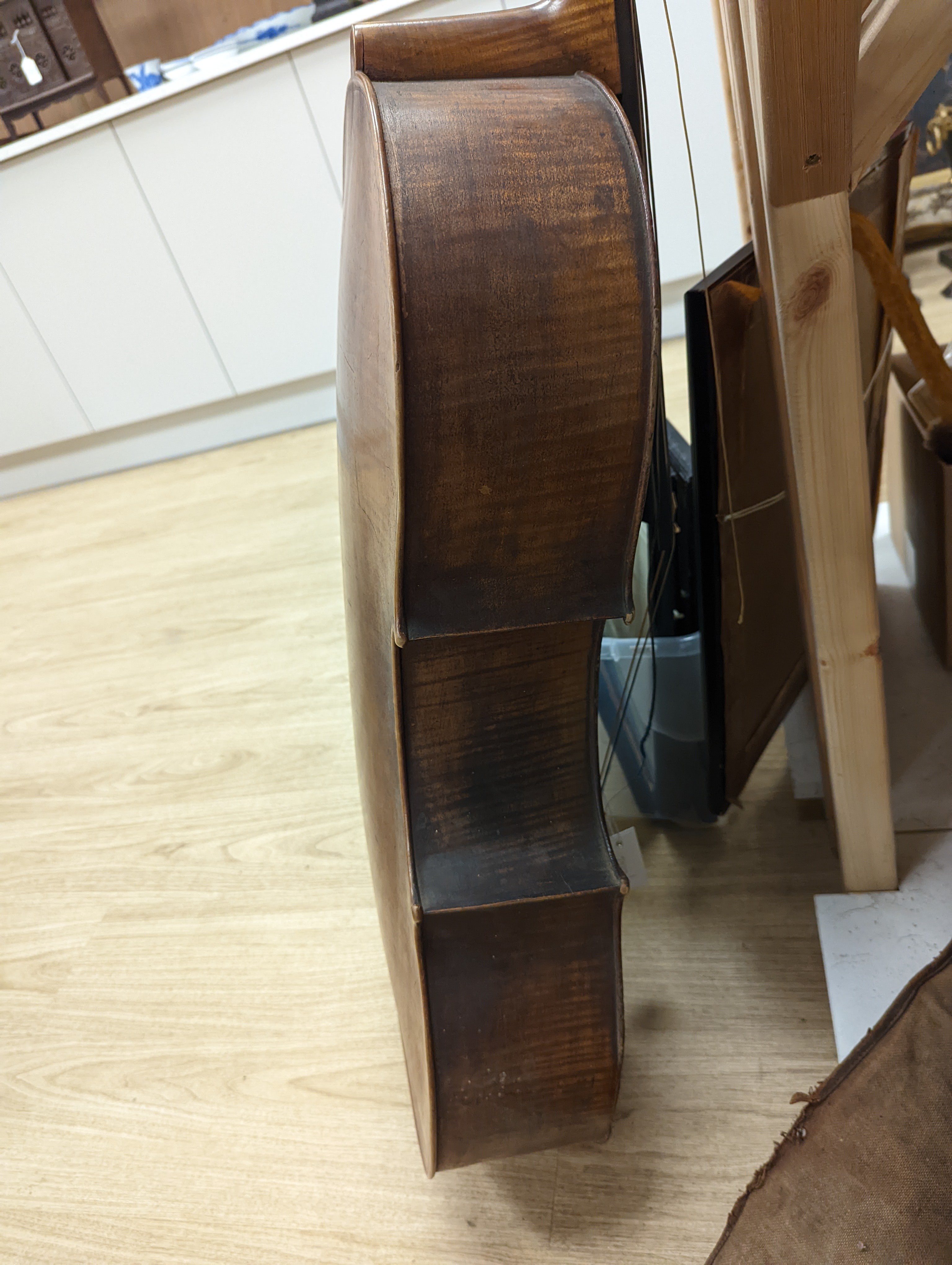 A late 19th century French cello, lob 75.5cm, canvas case with bow